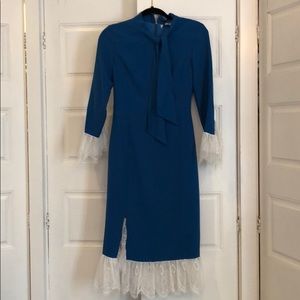Blue dress with lace trim. New with tags
